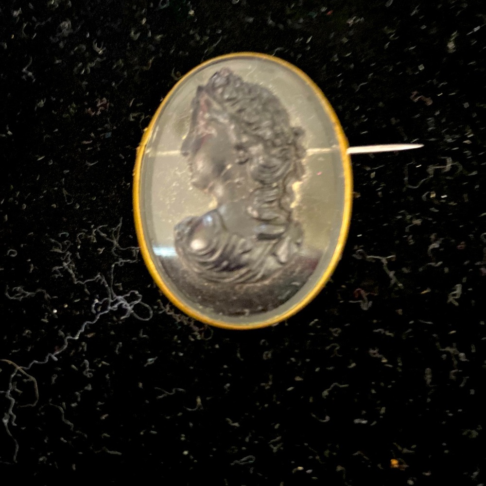Nice old glass cameo , gold trim
